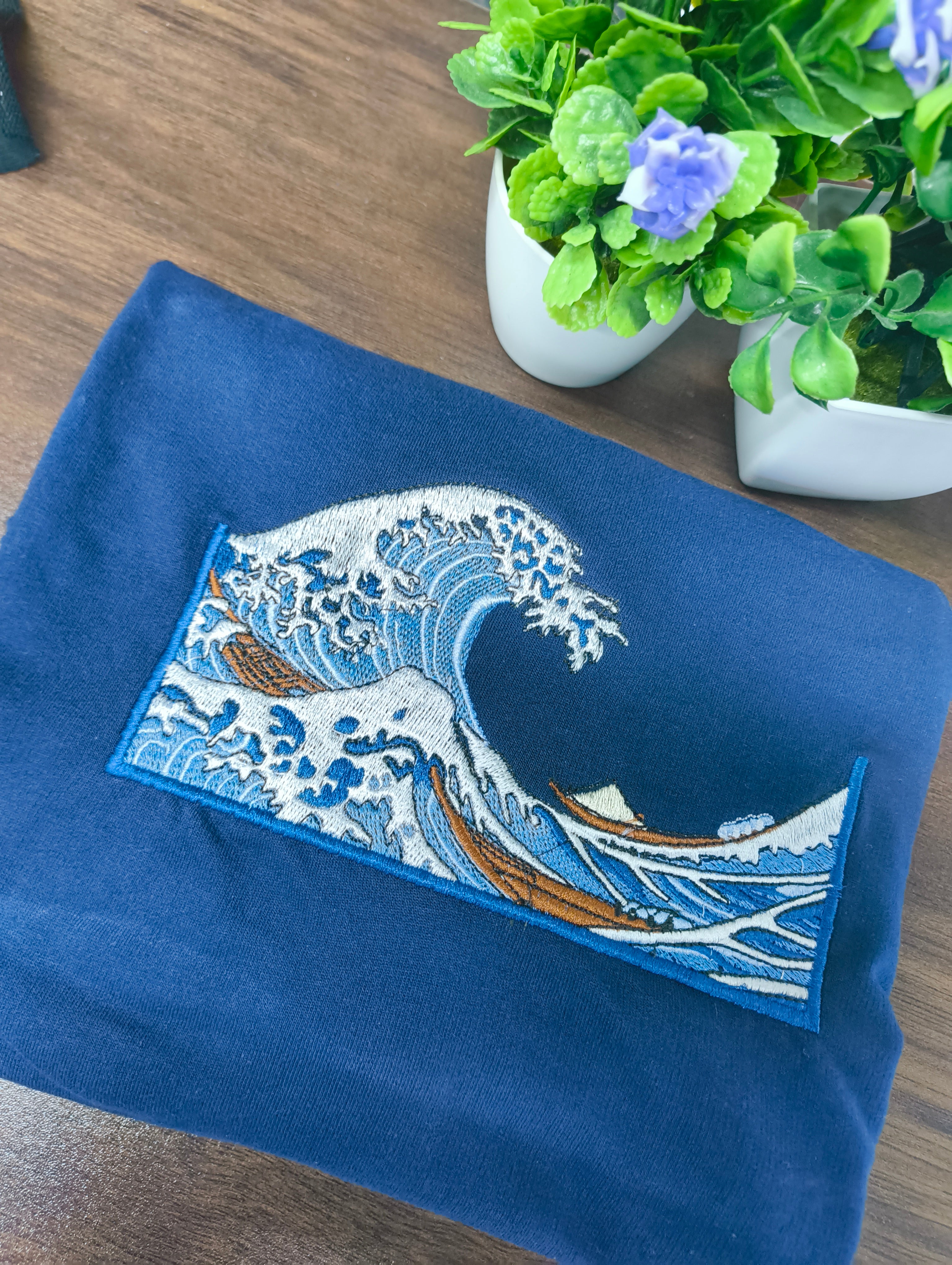 🌊 Ocean vibes stitched to perfection ✨
A wave of art you can wear with pride.