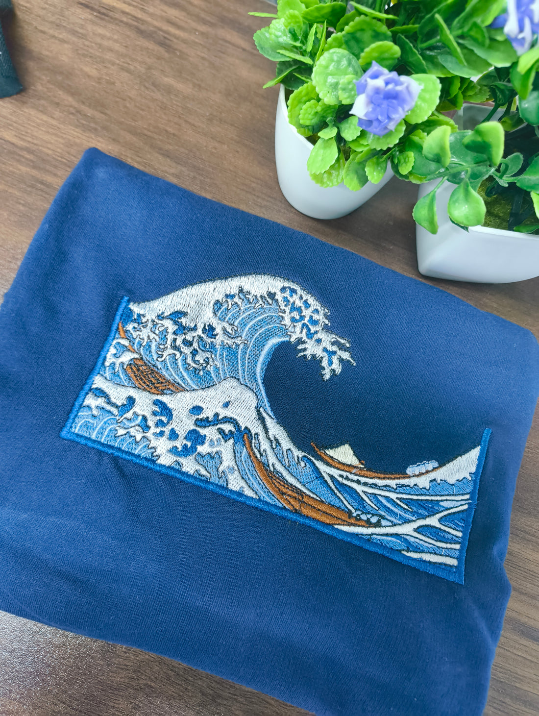 🌊 Ocean vibes stitched to perfection ✨
A wave of art you can wear with pride.